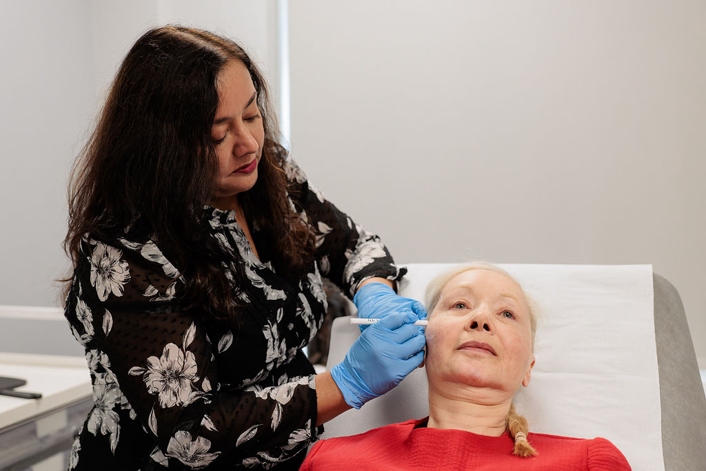 A woman preparing to undergo Polynucleotide Treatment for facial rejuvenation
